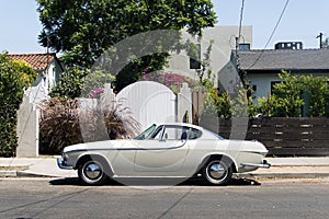 A view of a vintage classic car van in the street