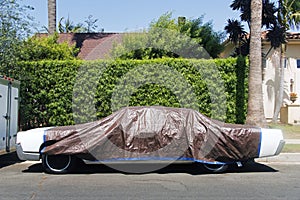 A view of a vintage classic car van in the street