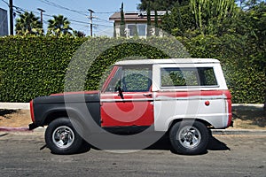 A view of a vintage classic car van in the street