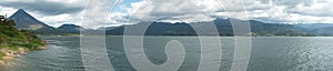 View of Volcan Arenal and Lake Arenal in Parque Nacional Volcan Arenal in Costa Rica