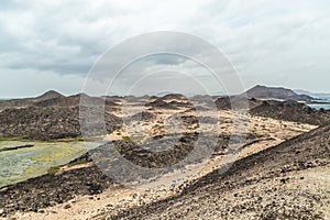 View of volcanic landscape of Isla de Lobos in Fuerteventura, Canary Islands, Spain photo