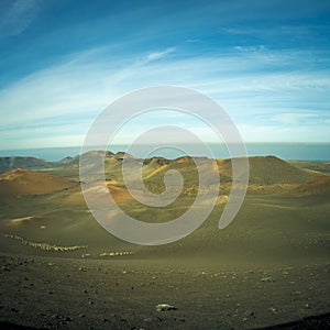 View on the volcanic landscape of Timanfaya National Park on the Canary Island of Lanzarote in Spain