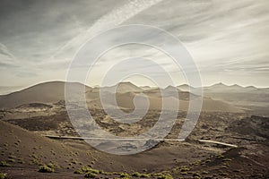 View on the volcanic landscape of Timanfaya National Park on the Canary Island of Lanzarote in Spain