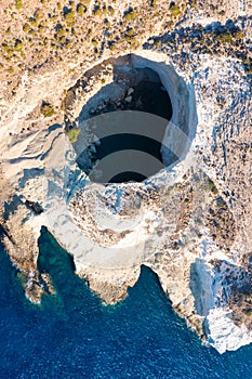 View of the volcanic open cave of Sykia, Milos island, Cyclades, Greece