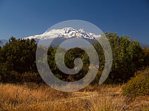 View of Volcano Iztaccihuatl in Mexico photo