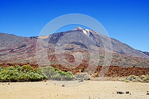 View of volcano Mount Teide Teide Peak and surroundings with hardened lava. National Park, Tenerife, Canary Islands, Spain.