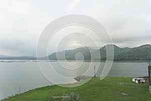 The view of the Wadaslintang reservoir is very beautiful with wide and green meadows.
