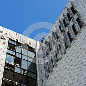 View of a wall with the broken windows