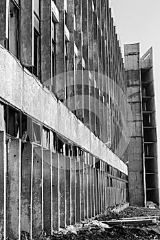 View of a wall with the broken windows and lattices. Look at an angle