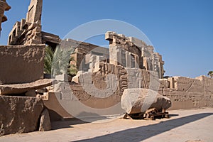 View of the wall with Egyptian hieroglyphs and ancient drawings at Karnak Temple. Luxor, Egypt