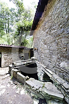View of the walls of a rural stone house typical of the villages