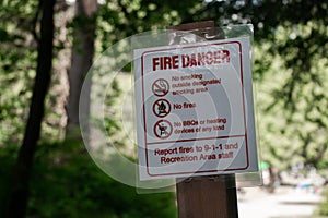 View of warning sign Fire Danger at the entrance of Buntzen Lake Recreation Area