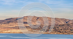View of Washoe Valley and Lake, Nevada from the South with the Galena Arch bridge and rolling hills