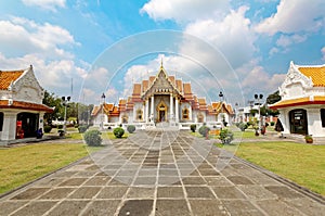 View of Wat Benchamabophit or The Marble Temple in Bangkok City Thailand, with its bright decorated golden roofs