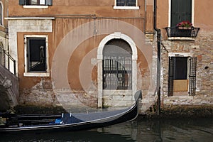 View of the  water channels, bridges and old palaces in Venice at sunrise during the lockdown