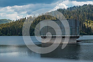 View of water dam or Vodna Nadrz in Nova Bistryca, Slovakia. Detail of house with turbines. Big water dam and reservoir for the