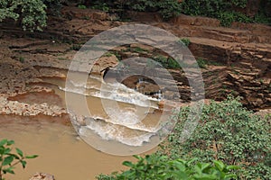 View of Water flowing down from the top of Tirathgarh Waterfall