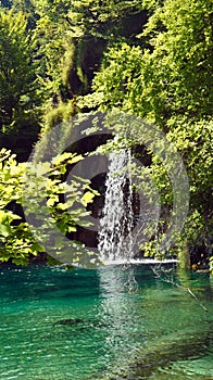 View of waterfall and beautiful nature landscape, Plitvice Lakes in Croatia, National Park, sunny day with blue sky