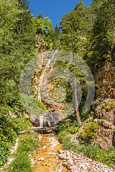 View at the Waterfall in Canazei - Italy