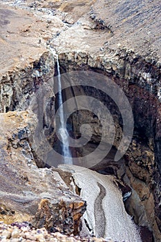 View of the waterfall in the canyon `Dangerous`. Kamchatka.