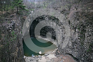 View of the waterfall in the cliff of columnar joints