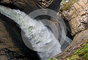 View waterfall Trummelbach fall in mountains, valley of waterfalls