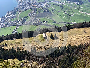 View of the Weggis village on the shore of Lake Lucerne VierwaldstÃÂ¤tersee below the Rigi Mountain