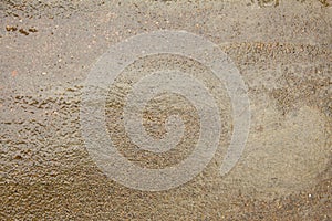 View of wet cement floor texture. use for wet floor background