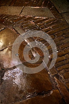 View of a wet pavement in the Shambles area of  York, North Yorkshire on February 19,