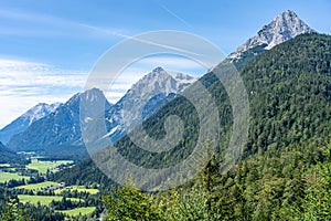 view on wetterstein mountains and leutasch valley from a nearby mountain in summer