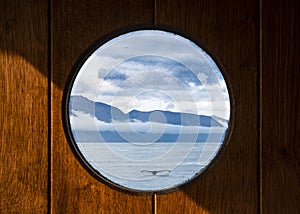 View of the whale tale from the porthole. Husavik, Iceland.