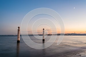 View of the wharf columns in square of commerce at sunset, Lisbon, Portugal, Europe