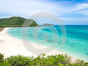 View of white beach sand and the sea
