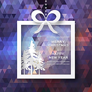 View of white christmas trees in box with bow