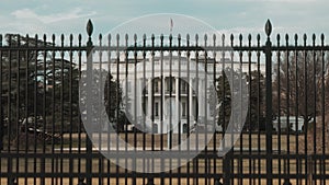 View of The White House in Washington, DC from behind a fence