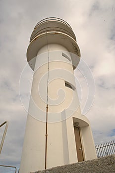 A view of a white lighthouse of Cabo ortegal (CariÃ±o) in the Galician coast photo