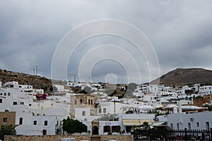 View of the white old houses of the 16th-18th centuries in ancient Lindos in August. Rhodes, Dodecanese, Greece.