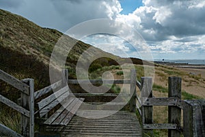 View on white sandy  beach, dunes and water of North sea between Vlissingen en Domburg, Zeeland, Netherlands