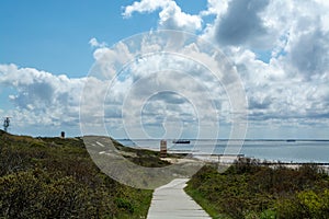 View on white sandy  beach, dunes and water of North sea between Vlissingen en Domburg, Zeeland, Netherlands