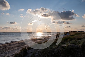 View on white sandy  beach, dunes and water of North sea between Vlissingen en Domburg, Zeeland, Netherlands