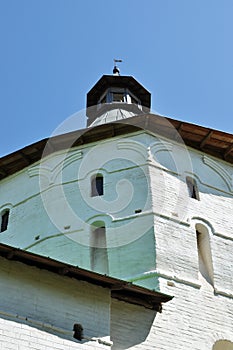 View of the white stone tower of the monastery.