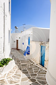A view of whitewashed street with typical Greek architecture in Lefkes village on Paros Island