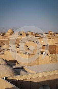 View of wind towers and architecture of yazd city old town in iran