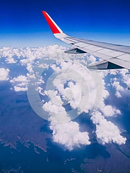 View from window of an airplan during sunst or sunrise