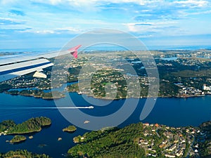 View from window of airplane flying over Norway Scandinavia.