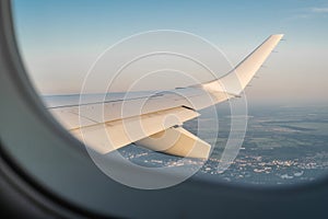 View through the window from the cabin of the aircraft. Sky scape view from clear glass window seat cabin crew to the aircraft