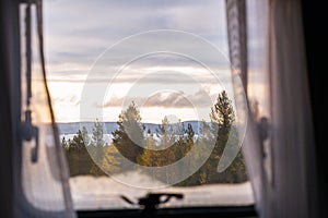 View from a window of camper to beautiful autumn lanscape in Lapland