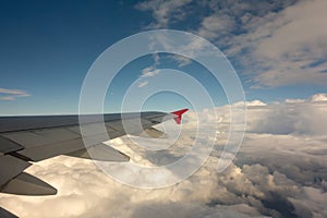 View of window at flying airplane, Plane wing. Traveling concept