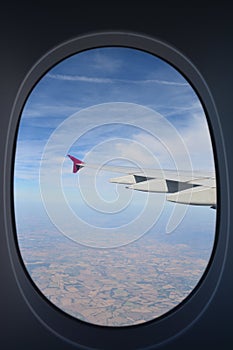 View  through window of a flying plane