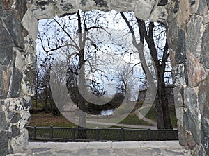 View from window of fortress on the park with pond, Sveaborg, Finland